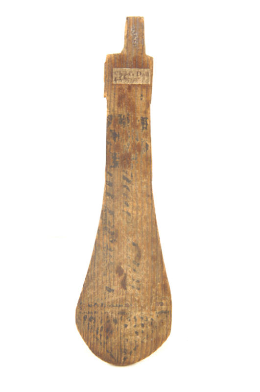 Ancient Egyptian wooden doll that was found in a burial tomb. 