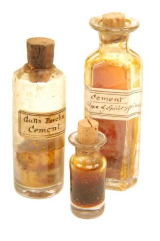 Three bottles of glue used by Richard Cuming. 