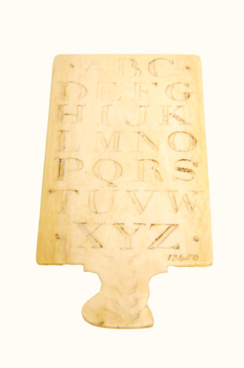 Ivory panel engraved with the alphabet
