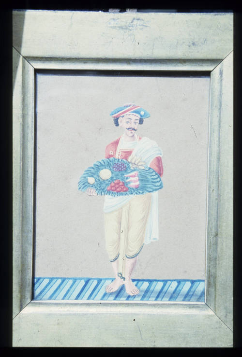 Indian miniature on glass: Man Servant with Dish of Fruit