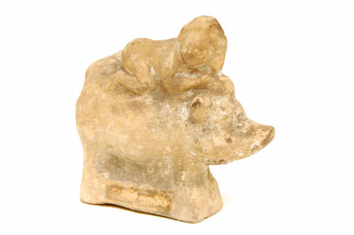 Statue of the Roman God Bacchus riding a pig.  