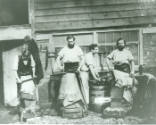 Photograph decipting workers working leather and animal hides at the Neckinger Leather Mills, i…