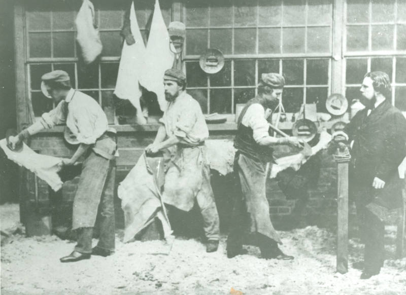 Neckinger Leather Mills 1862.Black and white photograph depicting workers staking and paring wh…