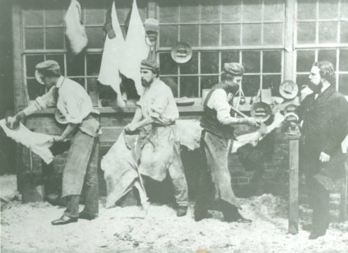 Neckinger Leather Mills 1862.Black and white photograph depicting workers staking and paring wh…