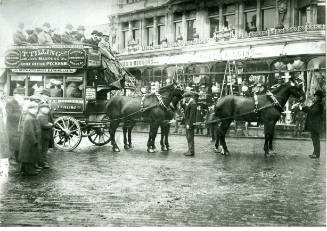 Black and white photograph depicting a four team horse bus, owned by the Thomas Tilling Bus Com…