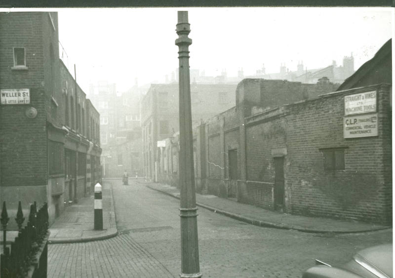 Black and white photograph depicting the remains of  the former Mint Street Workhouse, on the c…