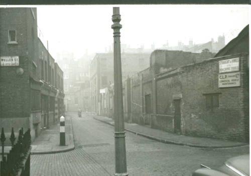 Black and white photograph depicting the remains of  the former Mint Street Workhouse, on the c…